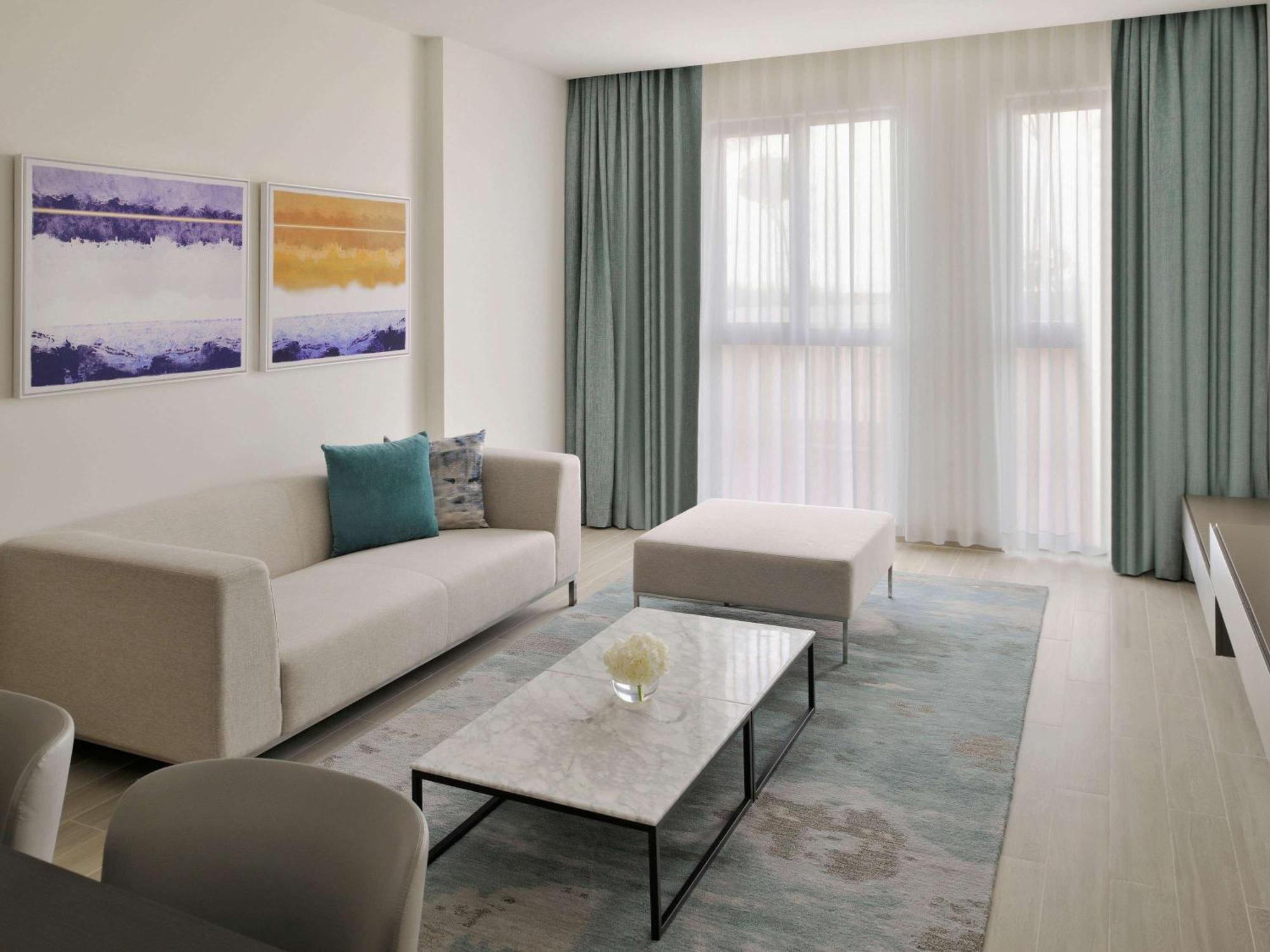 Moevenpick Hotel & Apartments Ghala มัสกัต ภายนอก รูปภาพ A living room