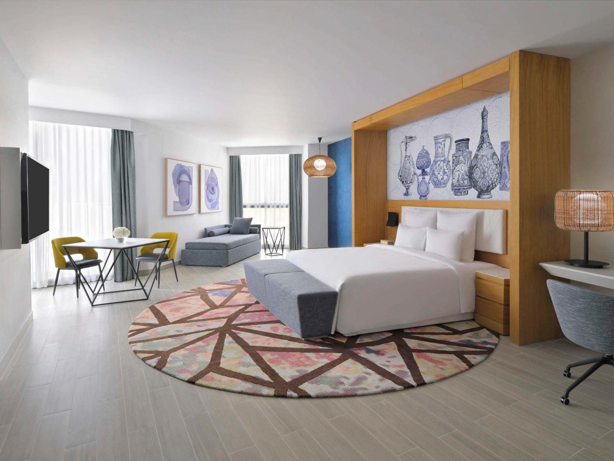 Moevenpick Hotel & Apartments Ghala มัสกัต ภายนอก รูปภาพ A room at the hotel